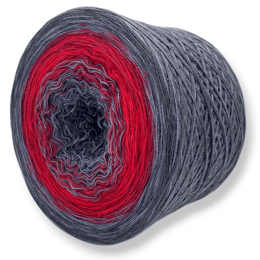 Farbvariante YO-YO RED begeistert mit einem eindrucksvollen Modal Farbverlauf von dunklem Anthrazit über lebendiges Rot bis zu hellem Grau, handgefärbte Farbverlaufswolle Modal aus natürlichen Fasern – Modal Farbverlaufsgarn zum Verlieben.