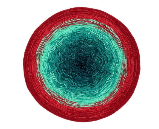 Farbvariante KLEEN LORELEI mit feinem Farbverlauf von kräftigem Türkis über sanftes Mint bis zu intensivem Rot, handgefärbte Farbverlaufswolle Modal aus natürlichen Fasern – Modal Farbverlaufsgarn zum Verlieben.